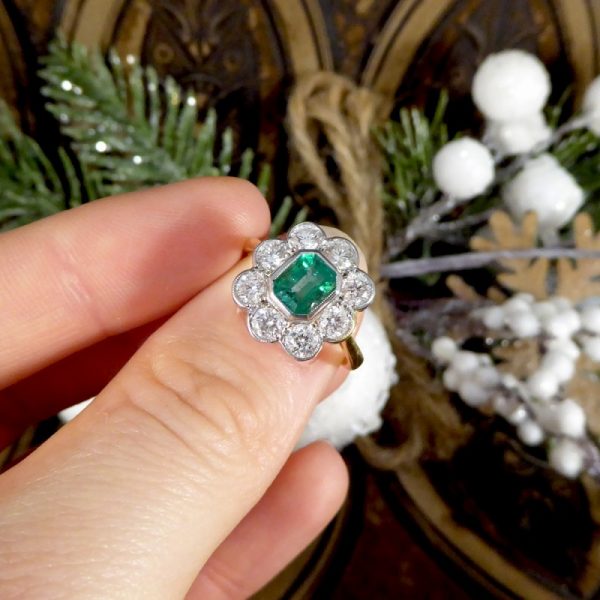 Contemporary 0.90ct Emerald and Diamond Cluster Ring