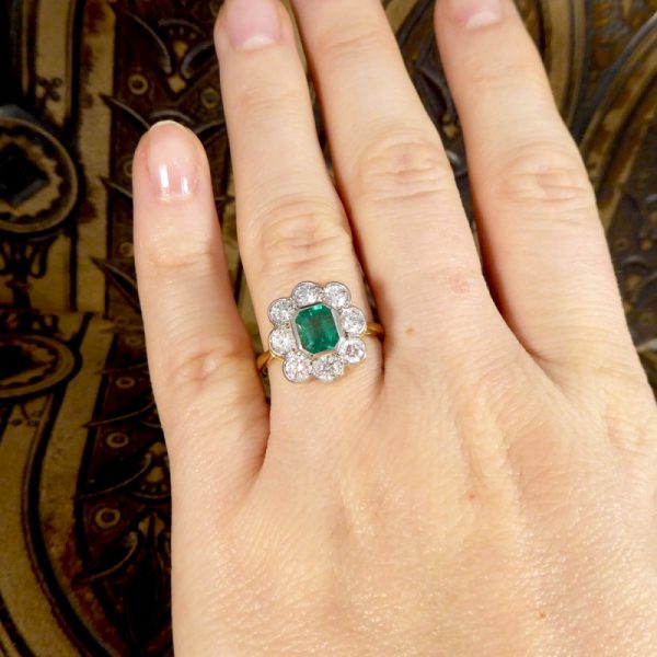 Contemporary 0.90ct Emerald and Diamond Cluster Ring