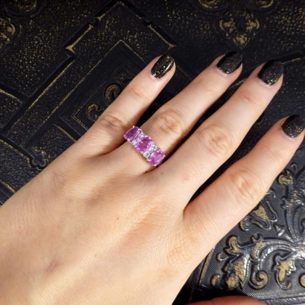 Pink Sapphire Three Stone Ring with Diamond Spacers