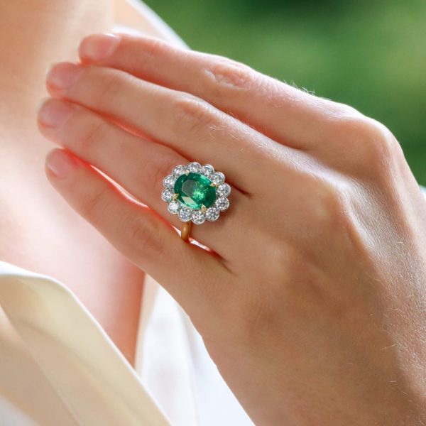 emerald and diamond oval shape engagement ring over 3 carats