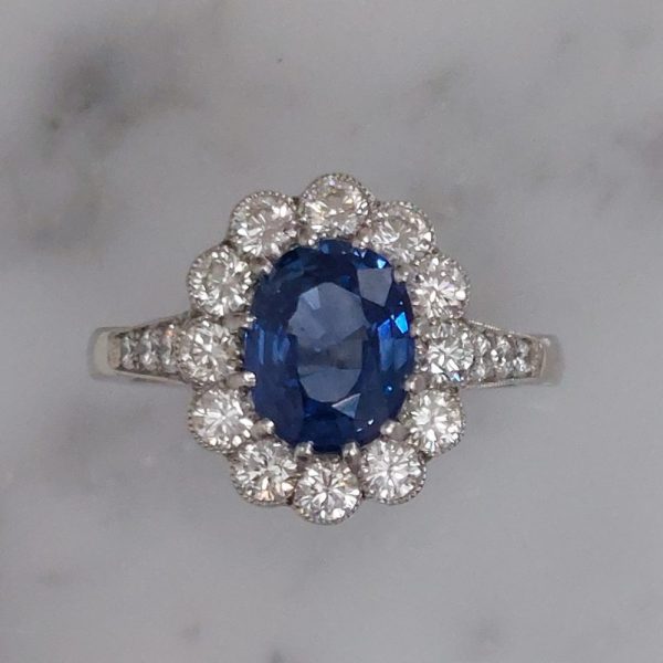 2.65ct Oval Sapphire and Diamond Cluster Ring