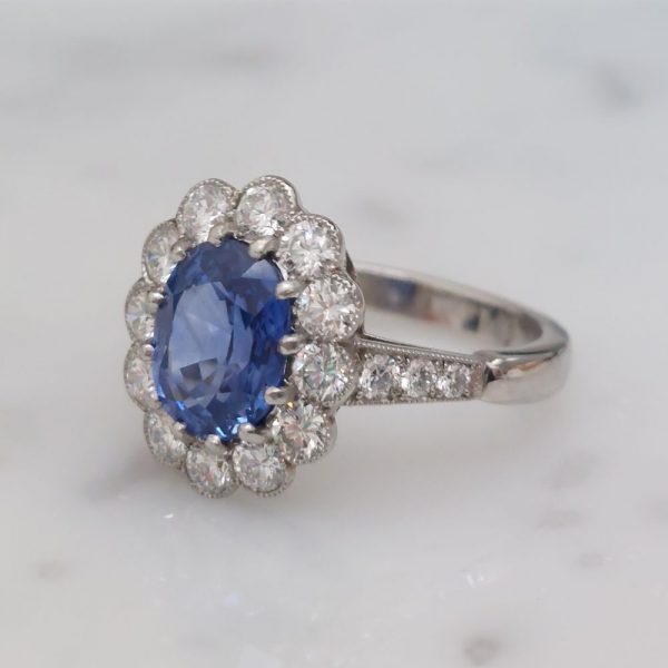 2.65ct Oval Sapphire and Diamond Cluster Ring