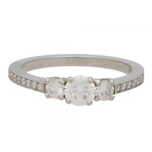 Modern Diamond Trilogy Engagement Ring With Diamond Shoulders in Platinum