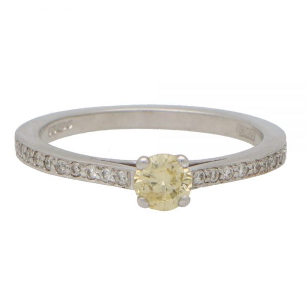 Modern Yellow Diamond Solitaire Engagement Ring with White Diamond Shoulders