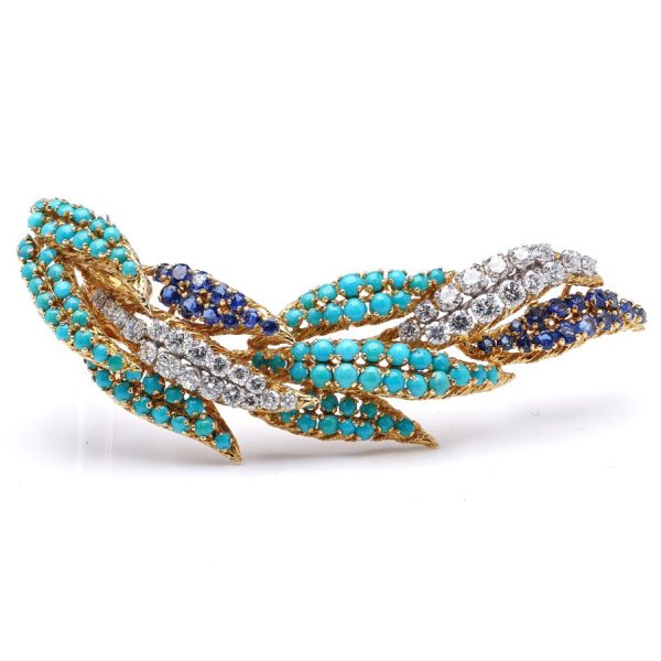 Vintage Kutchinsky Diamond Sapphire and Turquoise Leaf Brooch, 18ct yellow gold leaf design brooch set with 2.68cts round brilliant-cut diamonds, 1.92cts sapphires and cabochon turquoises, Circa 1970s