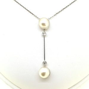 Elegant Pearl and Diamond Drop Pendant in Platinum