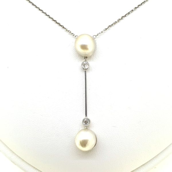 Elegant Pearl and Diamond Drop Pendant in Platinum