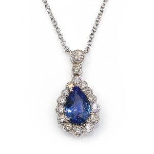 Sapphire and diamond pear shape cluster pendant necklace