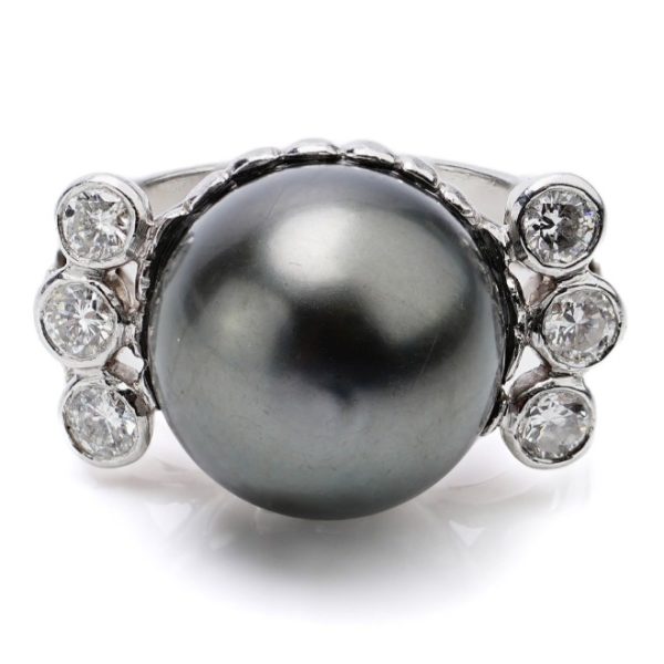 Tahitian Pearl and Diamond Cocktail Ring, central 12mm grey Tahitian pearl flanked each side by three round brilliant-cut diamonds 0.60 carat total, in 18ct white gold