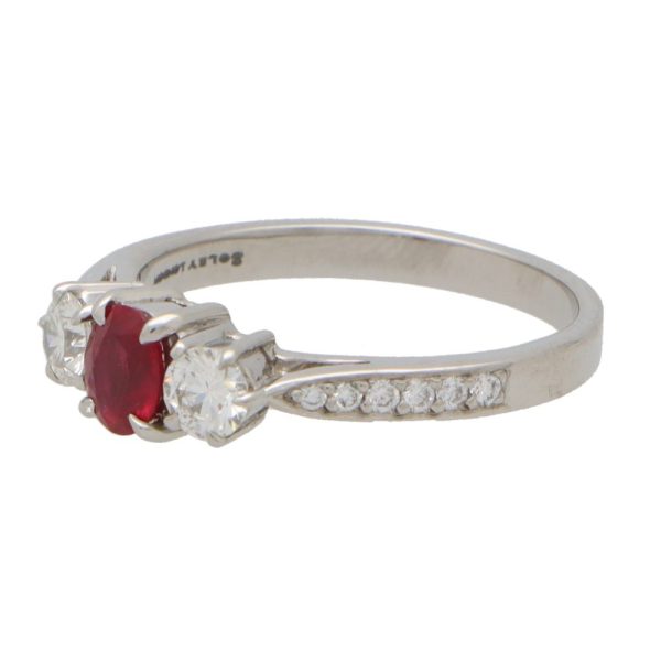 0.42ct Oval Ruby and Diamond Three Stone Engagement Ring in Platinum