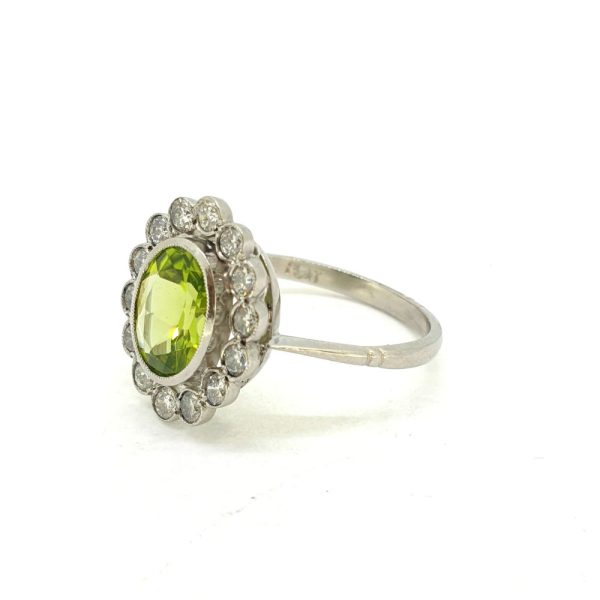 1.60ct Oval Peridot and Diamond Floral Cluster Ring