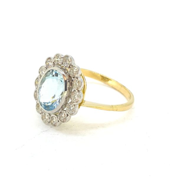 1.70ct Aquamarine and Diamond Oval Floral Cluster Ring in 18ct Yellow Gold