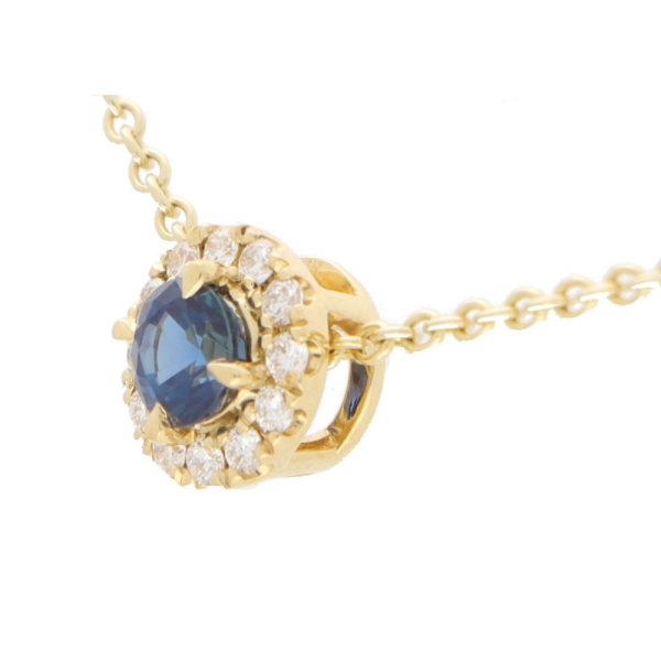 sapphire and diamond pendant circular yellow gold