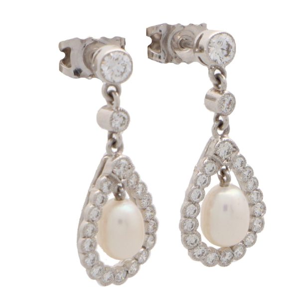 Pearl and diamond drop earrings long