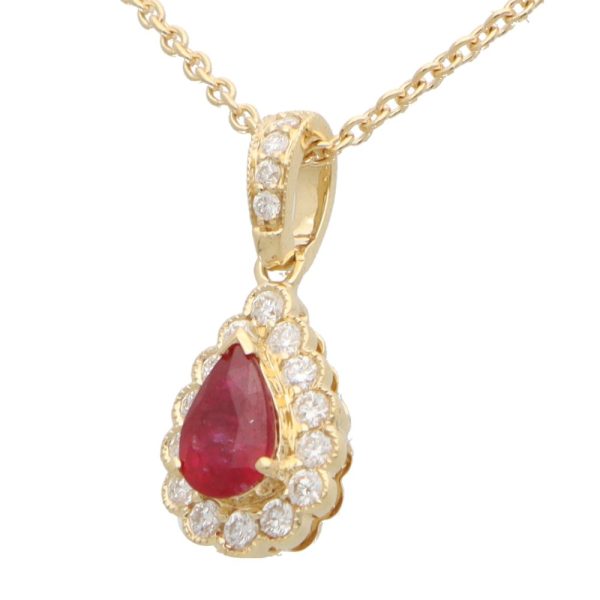 0.41ct Pear Cut Ruby and Diamond Cluster Pendant in 18ct Yellow Gold