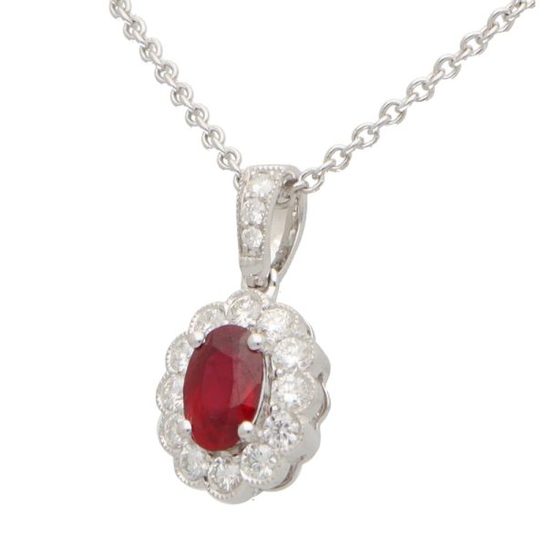 0.54ct Ruby and Diamond Oval Cluster Pendant in 18ct White Gold