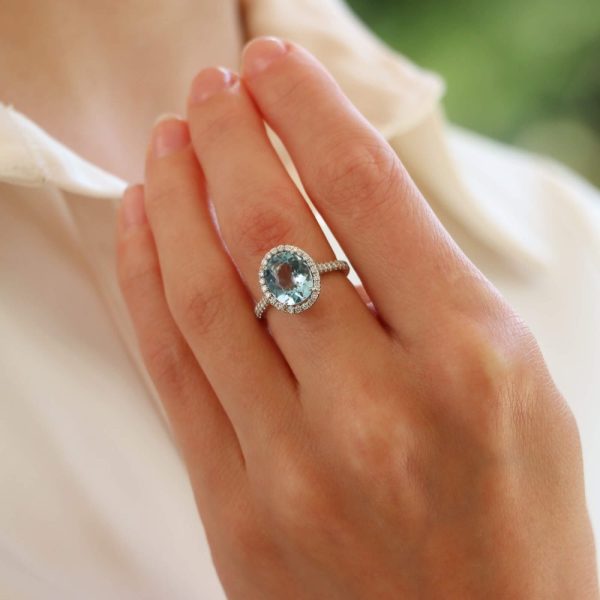 2.30ct Oval Aquamarine and Diamond Halo Cluster Engagement Ring in Platinum