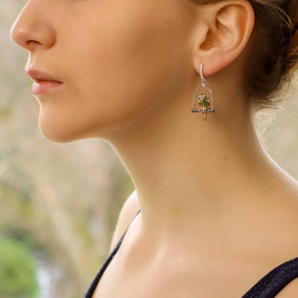 Tsavorite Garnet and Fancy Colour Sapphire Parrot Earrings, perched parrots on swing set with blue, pink, orange and yellow sapphires, rubies, tsavorite garnets and diamonds