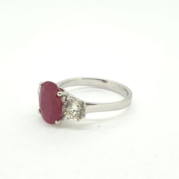 2.87ct Oval Ruby and Diamond Three Stone Engagement Ring in 18ct White Gold