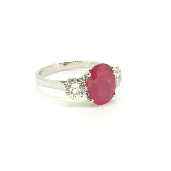 2.87ct Oval Ruby and Diamond Three Stone Engagement Ring
