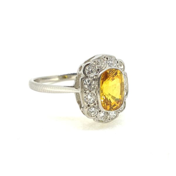 2.10ct Oval Yellow Sapphire and Diamond Flower Cluster Ring in Platinum