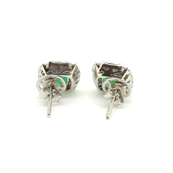 Fine pair of 3.79ct Emerald and Diamond Cluster Earrings in 18ct White Gold