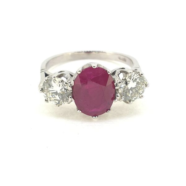 3.75ct Oval Ruby and Diamond Three Stone Engagement Ring in Platinum