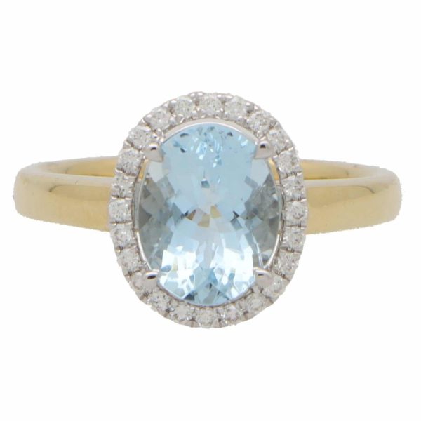 3.39ct Oval Aquamarine and Diamond Halo Cluster Engagement Ring