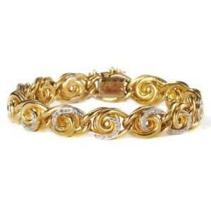 Antique French Art Nouveau Diamond Set Gold Bracelet, connecting 18ct yellow gold swirling links with applied platinum grain settings set with rose-cut diamonds. Circa 1900