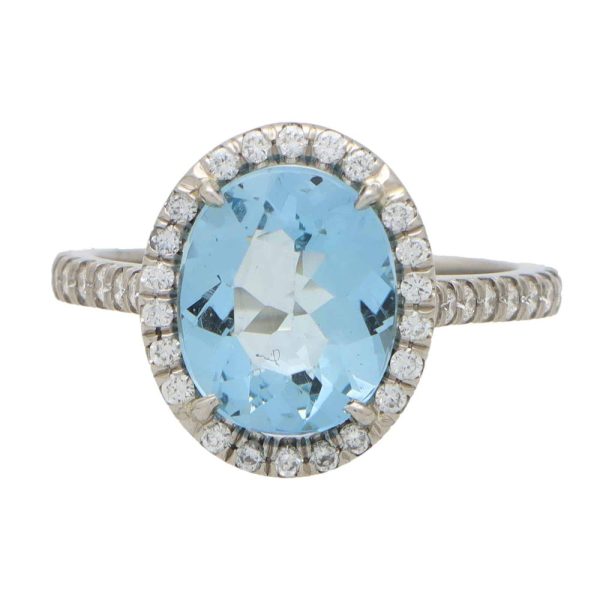 2.30ct Oval Aquamarine and Diamond Halo Cluster Engagement Ring