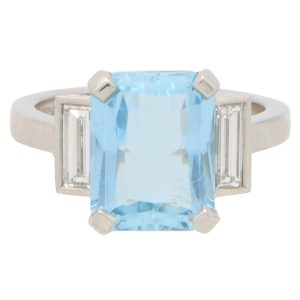 3.80ct Emerald Cut Aquamarine and Baguette Diamond Three Stone Engagement Ring in Platinum