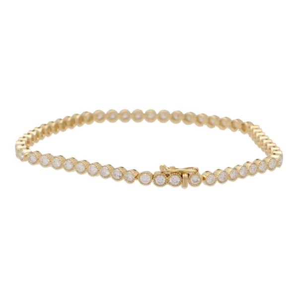 Rub Over Diamond Line Bracelet in 18ct Yellow Gold, 2.88 carat total, 55 round brilliant cut diamonds bezel set in yellow gold, G/H colour with VVS clarity