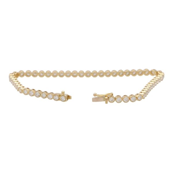 Rub Over Diamond Line Bracelet in 18ct Yellow Gold, 2.88 carat total, 55 round brilliant cut diamonds bezel set in yellow gold, G/H colour with VVS clarity