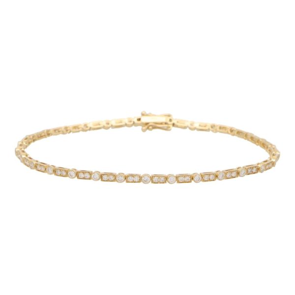 Diamond line bracelet set in 18 carat yellow gold.