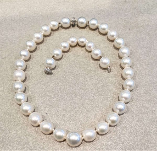 Vintage South Sea Pearl Graduated Necklace, with two diamond set clasps to allow the necklace to be worn at 16 inches and 20 inches. Circa 1990s