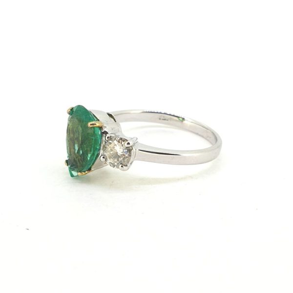 2.15ct Pear Cut Emerald and Diamond Trilogy Engagement Ring