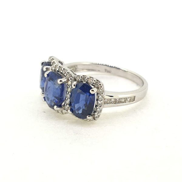 Oval Sapphire and Diamond Three Stone Cluster Dress Ring