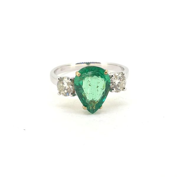 2.15ct Pear Cut Emerald and Diamond Three Stone Engagement Ring