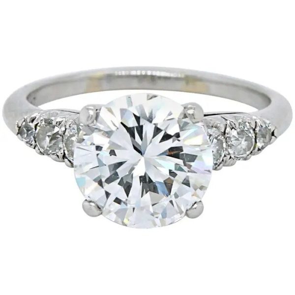 GIA Certified 2.72ct Diamond Solitaire Engagement Ring, 2.72 carat round brilliant-cut diamond with G colour and VS2 clarity flanked by three smaller round brilliant cut diamonds on each side in platinum. Comes with GIA certificate