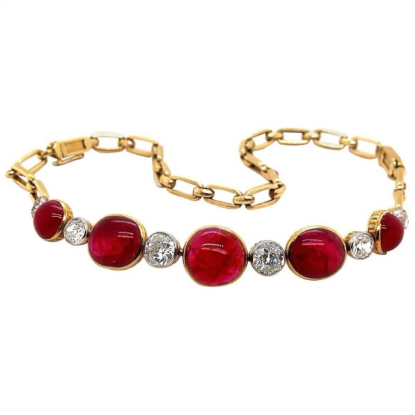 Victorian Antique Cabochon Burmese Ruby and Old Cut Diamond Bracelet-come-Necklace, five big 30cts oval cabochon-cut rubies alternated with six 6cts old European cut diamonds to gold chain links. Comes in original antique box from German court jeweller. Circa 1890s
