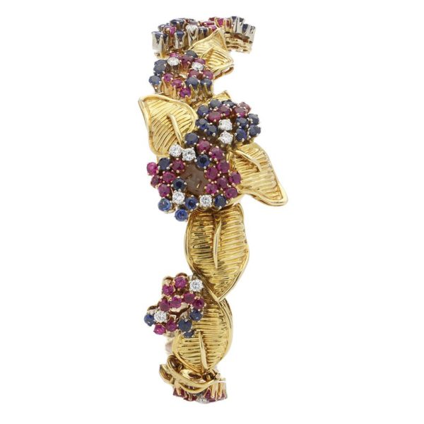 Vintage Gubelin 18ct Yellow Gold Ruby Sapphire Diamond Bracelet Watch, set with 2.04cts sapphires, 2.32cts rubies and 0.60cts diamonds, Circa 1960s