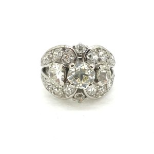 Old Cut Diamond Three Stone Cluster Buckle Ring, 3.50 carat total