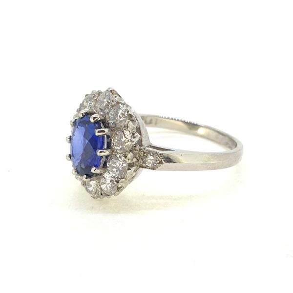 1.50ct Sapphire and Diamond Oval Cluster Engagement Ring