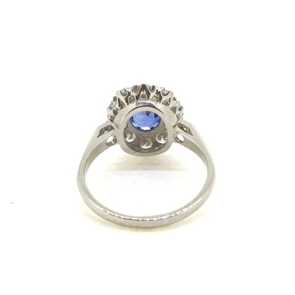 1.50ct Oval Blue Sapphire and Diamond Cluster Engagement Ring in 18ct White Gold