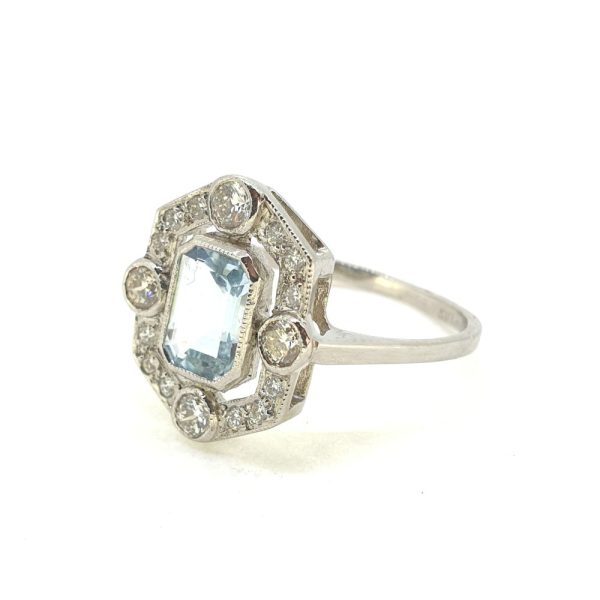 Contemporary 0.90ct Aquamarine and Diamond Fixed Halo Cluster Ring