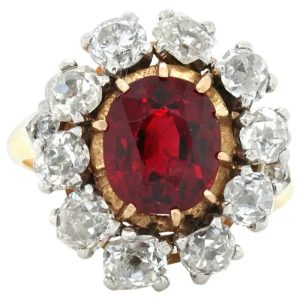 Victorian Antique 2.41ct Natural Red Spinel and Old Cut Diamond Cluster Ring, central vivid red natural spinel surrounded by old cut diamonds in 18ct yellow gold with diamond set shoulders. Early Victorian, 19th century, Circa 1860s