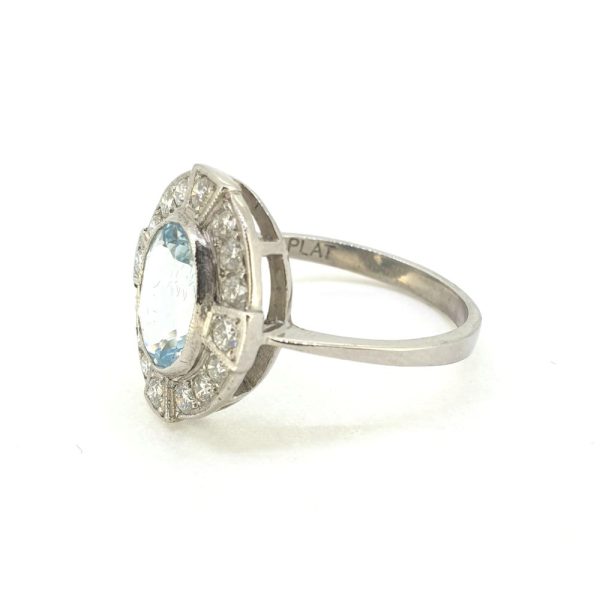Contemporary 1.50ct Oval Aquamarine and Diamond Cluster Dress Ring in Platinum