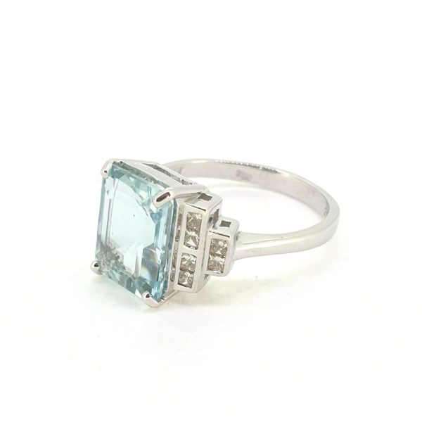 2.98ct Emerald Cut Aquamarine Ring with Princess Cut Diamond Shoulders