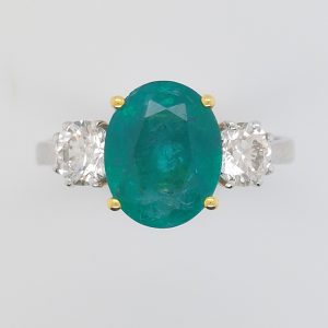 2.44ct Oval Emerald and Diamond Three Stone Ring
