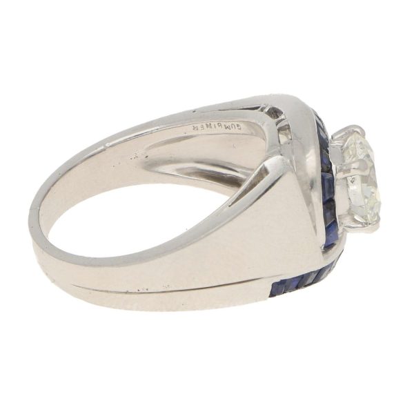 Oscar Heyman Art Deco Diamond and Sapphire Twist Bow Cocktail Ring in Platinum, designed by Oscar Heyman for David Gumbiner